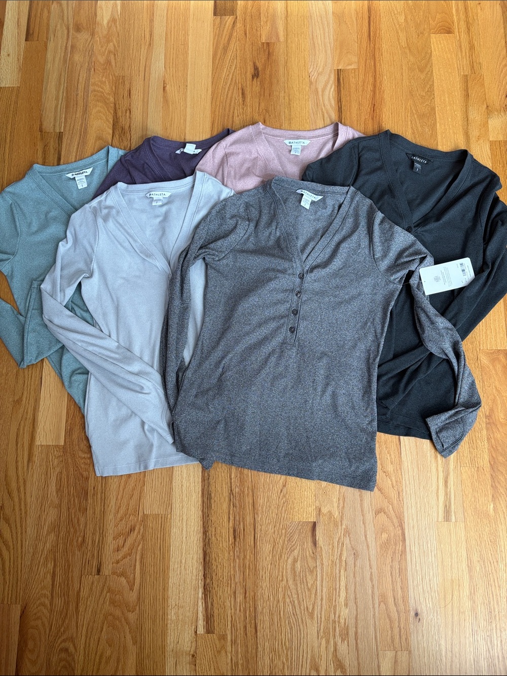 Collection of 6 Athleta Uptempo Ribbed Long-Sleeve Henley Tops